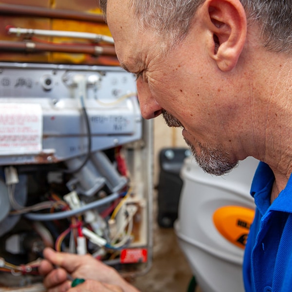 Professional inspection of a hot water system in Perth