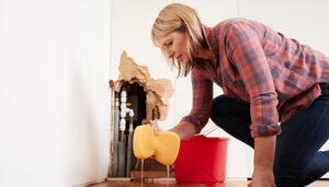 Plumbing emergency causing water damage in a home